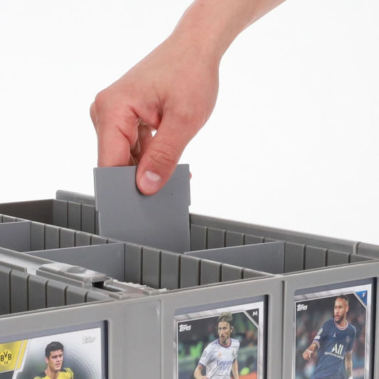 12 Pack Partition Organizers Gray Color - 3,200 cards gray-color bin with partition in hand being slotted into place. Front of bin displaying soccer cards